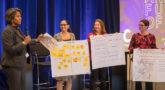 Design thinking teams presented their solutions to the larger group.